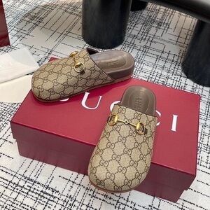 Gucci Beige and Brown Patterned Mules with Gold Detail